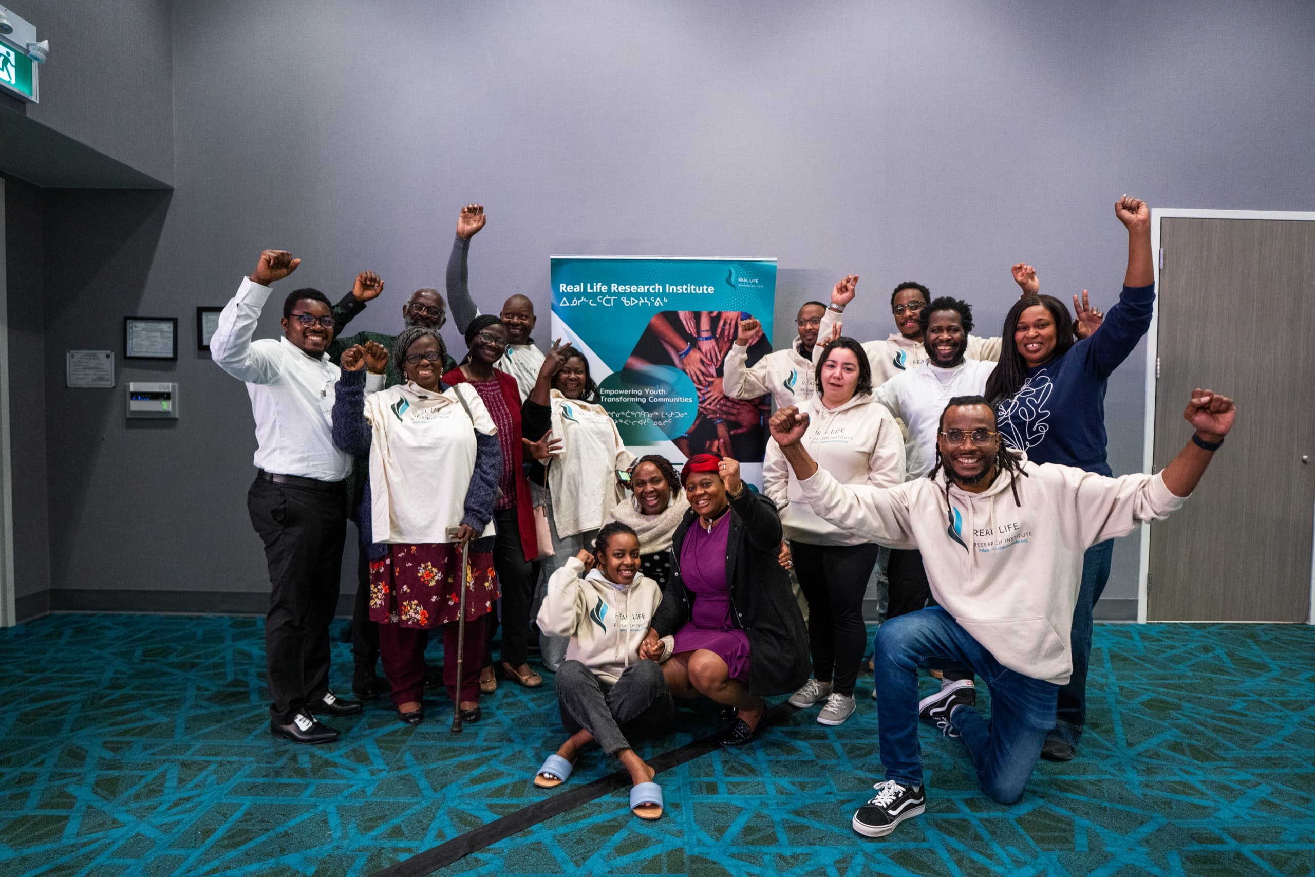 RLRI team and partners gathered at a community event
